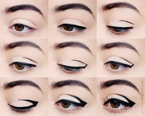 Upside down eyeliner tutorial!
http://go-vamp.blogspot.com