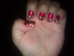 My try at Holiday nails. Red with gold bows (a little nutcracker body on the thumbs) 
