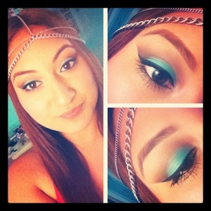 Laura Mercier creme shadow in aqua mixed with turquoise caviar stick and cafe au lait in the crease.