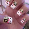 Hello kitty cheetah nails