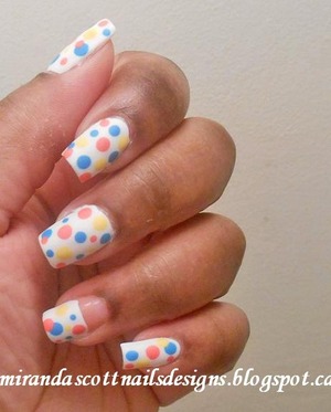 For this manicure the polishes I used were Essie Marshmallow for the base colour 3 coats till opaque. And for the polka dots I used Sally Hansen Blue Me Away, Mellow Yellow and Coral Reef. Then I applied Born Pretty matte polish. 