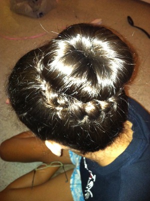 Made a braid along side the bottom of bun