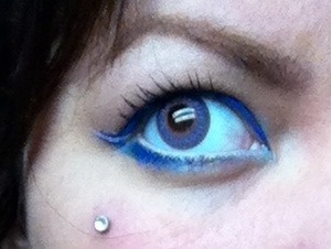 I used Sephora's blue liquid liner and blue mascara. I lined my bottom inner lid with white and winged it out on the sides. 