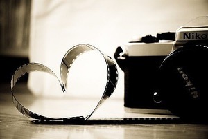 I found this photo online of an older Nikon (not sure of the model) and film... LOVE. 