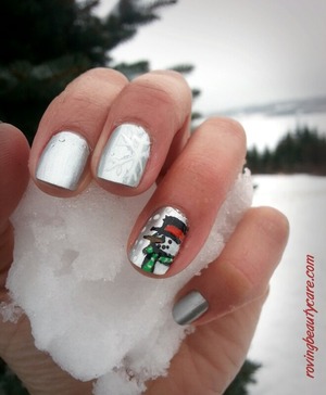 Don't let the snow get you down, go out, have fun, and be a kid again! 
Nail art by Roussa A. 
www.rovingbeautycare.com