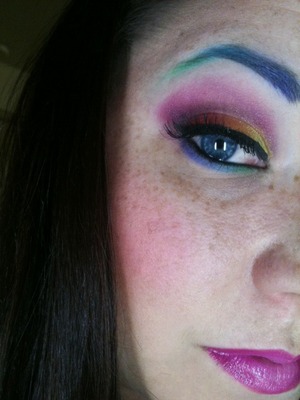 Got bored and started playing with makeup.  Did a rainbow eye and gradient brow.
