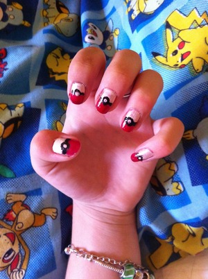 My girlfriend loves Pokemon & so I thought I'd make my nails into pokeballs, it's taken me hours /: