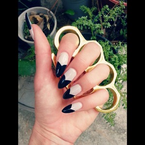 two-tone black and nude stilleto nails
