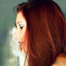 red hair, metalic makeup 