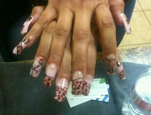 Leopard print inspired nail art. everything is freehand. my client asked me to autograph one of her nails. 