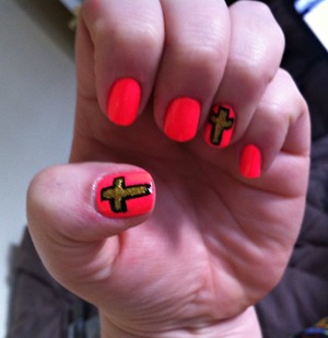 Cross.( nails look orange but they are hot pink)
