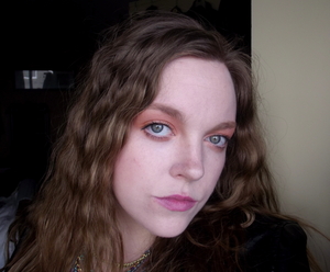 I've seen pastel orange eyes and pink lips in so many magazine's as a spring 2012 trend, so this is me trying it out with 80s crimped hair!