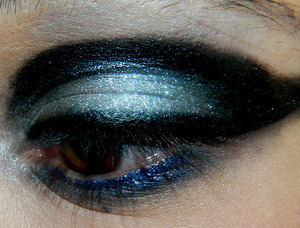 A combination of Black and Silver, with blue eyeliner and black cream eyeliner