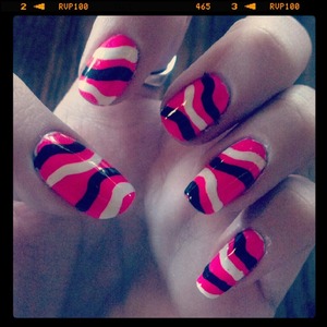 The base color for this nail art is China Glaze Pool Party, and I used black and white stripers for the lines.  :)