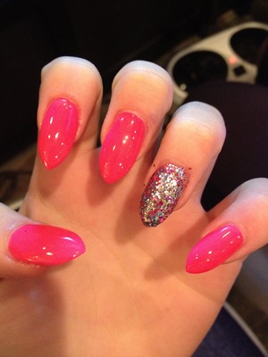 Hott Pink nail polish + a variety of color sparkles on ring finger on both hands! 