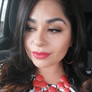 Date night look using gold pigment on eyes and coral lippie