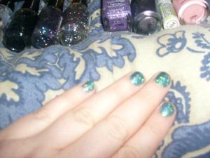 Short nail mani using Color Workshop glitter and teal Wet N Wild Wild shine nail polish that has been discontinued.