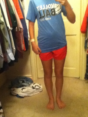 My blue volleyball shirt and my pink shorts.