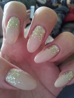 a great way to cover outgrowing acrylics. . stick some sparkle at the cuticle end