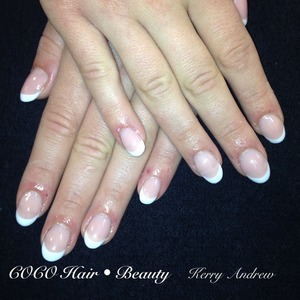 Short acrylic nails, shaped oval for more natural look. Sculptured 