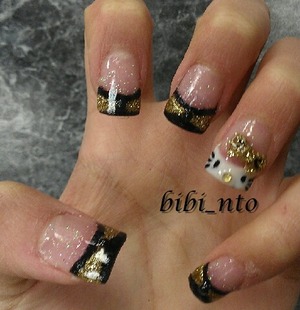 hello kitty, gold and black bows.