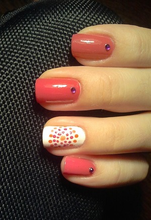 Pink nails with white and circle dots accent nail