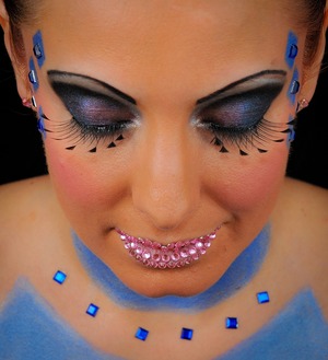 Look created using face paint by snazaroo , make up and gems 