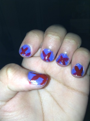 I posted it again a 5 year old did my nails she tried to make x's it's pretty good for a 5 year old 