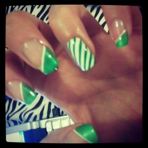 Green and while diagonal french with white + green stripes on ring finger <3 RIP sweet angels!!
