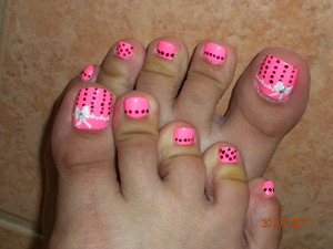 Neon pink with black dots and art