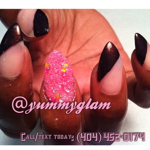 Stiletto Acrylic Nail Enhancements with a Pearlized Bronze Slanted Tip Accents with Pink and Yellow Caviar.