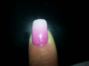 Magenta acrylic paint blended into white. Covered with 2 coats en vogue colour gel in sparkle and 2 coats sealer. 