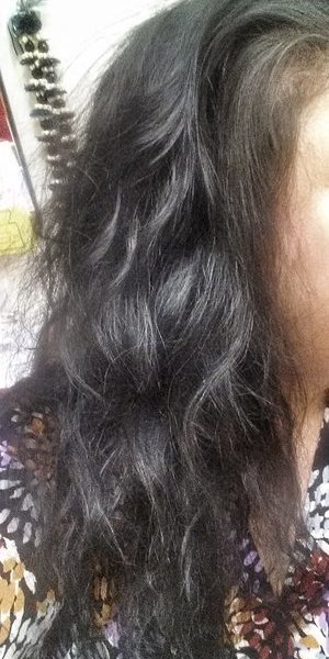 Used Garnier Fructisse spray gel to dry with diffuser to 80%; top knotted overnight. Used Garnier Fructisse Deconstructed Beach Spray to scrunch in the AM.