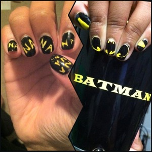 I finally cut the right size detailing brush and created this for my sister. She's the one who had the idea and we tweaked it to make it work. It's not perfect, but I am really proud of myself! I just used a white base, then painted everything yellow, then colored the negative spaces black on the theme song hand and the batman logo on the other hand. The stripey things on the thumb and pinky are supposed to be the spotlights.