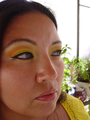 yellow and orange..  black cat eyelinver and a touch of gold. 