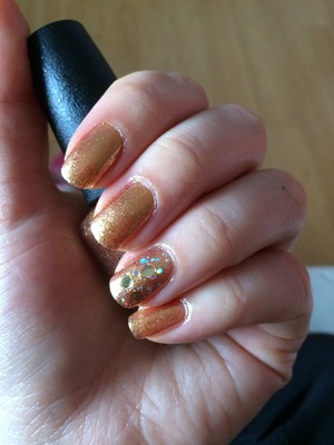 Gold look with OPI GoldenEye and OPI When Monkeys Fly! accent nail