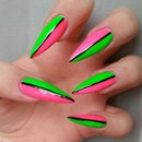 Neon pink and green stiletto nails