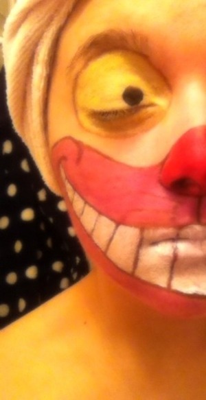 This a quick Cheshire Cat look, without having cover your whole entire face in grease makeup! :)