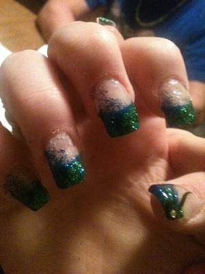 Blue tipped nails with green acrylic.