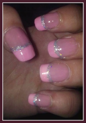 Light pink nail varnish with glittery line.