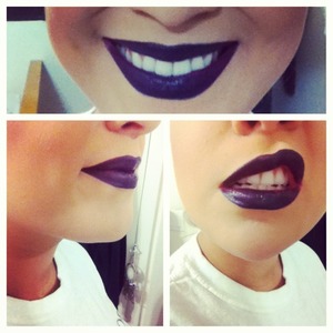 Black eyeliner allover lips and MACs Rebel smeared three times for a purple look.