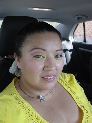 yellow , hot pink and turquoise eyeliner... 
i was feeling colorful  this particular day  and i loved it..  
primer potion - eden
ulta eyeshadow - honey bee
NYX trio eyeshadow - cherry/hot pink
Urban Decay liquid eyeliner - siren
urban decay curling mascara 
