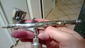 My brand new Iwata  HP-CH..... One of the finest airbrushes on the market.  I love it and it finally belongs to me.  :)  