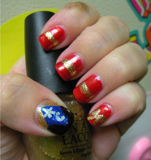 OPI Dazzled by Gold, OPI Dear Santa, China Glaze Blue Sparrow and Color Club Worth The Risque