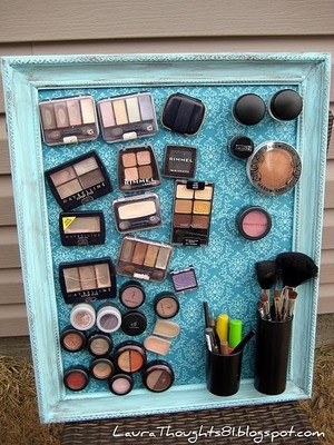Fabulous way to organize your makeup!!!....Put magnets on a cute fabric lined frame...love this y'all!