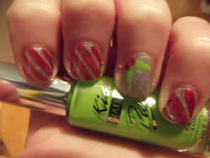 My friend Sadie's Christmas nails, Candy Canes and Mistletoe.