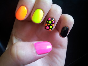 Neon nails with accent polkadots! One of my favorites that I did.