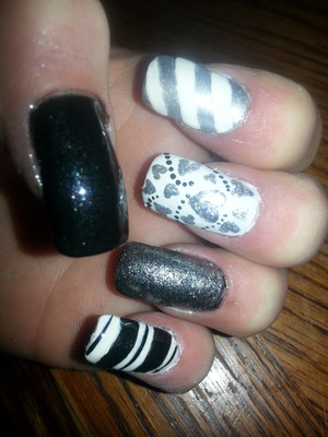 Black, silver and white mani.