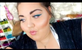 GRAPHIC EYELINER | BLUE GLITTER & CORAL