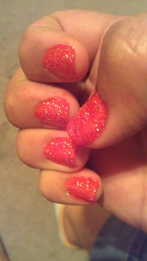 Red base with a top coat of glitter polish 